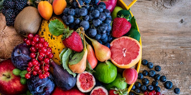 Many kinds of fruits on the table.