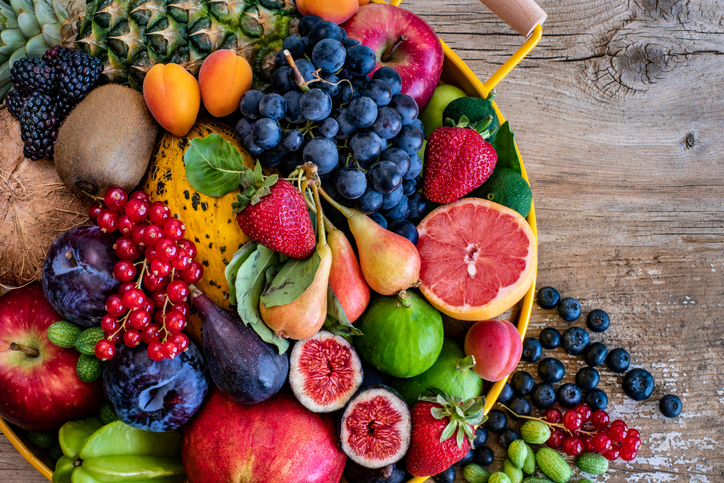 Many kinds of fruits on the table.